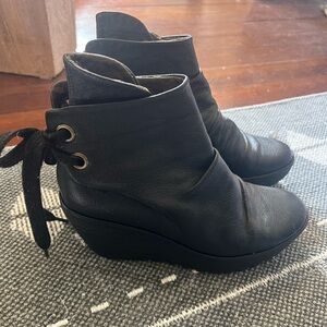 Fly London wedge booties with lace up back and signature heel